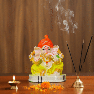 Vibrant 9 Inch Sitting Pagdi Ganesha Idol - Orange Turban Statue