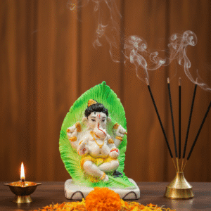 9.5-Inch Patta Ganesha Idol on Green Leaf Base