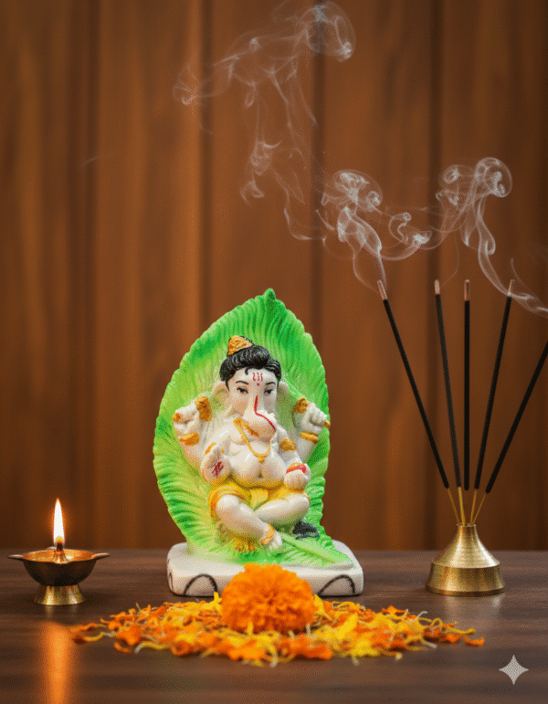 9.5-Inch Patta Ganesha Idol on Green Leaf Base